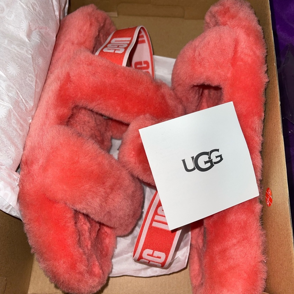 Pink Ugg slides